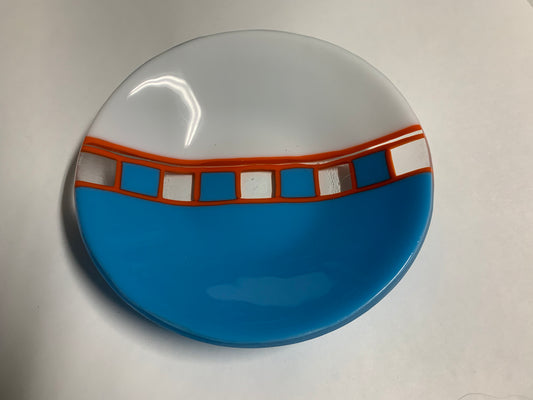 Blue and white bowl with orange accents.