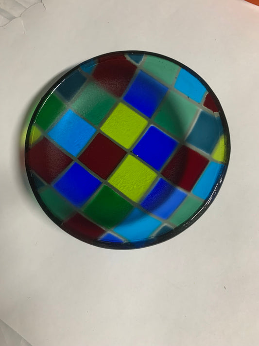 Checkerboard multicolored bowl.